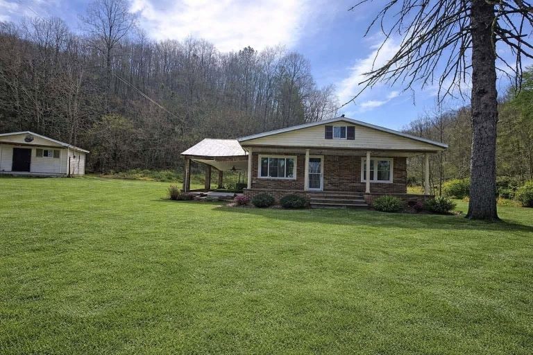 Affordable Brick Home on Nearly Seven Acres wit